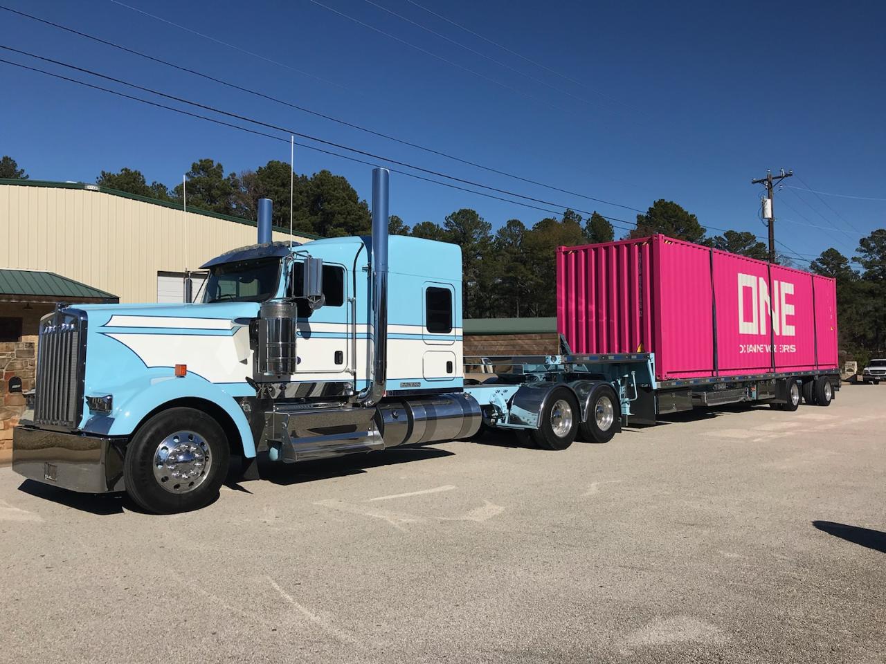 High Cube Container on a step deck trailer moving Coast to Coast
